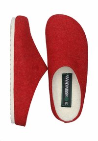 Red felt slippers with a soft white lining, rounded toe, and a non-slip textured sole; features a small spiral logo on the side.