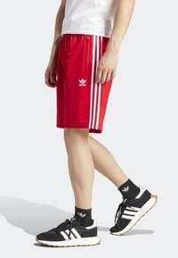 adidas Originals Teplákové kalhoty - red