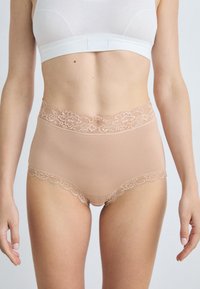 Beige high-waisted briefs with a delicate lace trim at the top and bottom edges, featuring a smooth, soft material texture throughout.