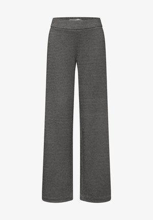 Pantaloni a gamba larga in tessuto nero e bianco strutturato. Presentano una vita liscia e una silhouette ampia per comfort e libertà di movimento.