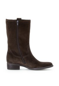 Brown suede ankle boots with a side zipper and a flat heel. Features a smooth texture and a tapered toe design.