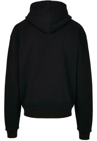 Sort langærmet hætte sweatshirt med hætte, ribbede manchetter og ribbet talje vist fra ryggen på en hvid baggrund.