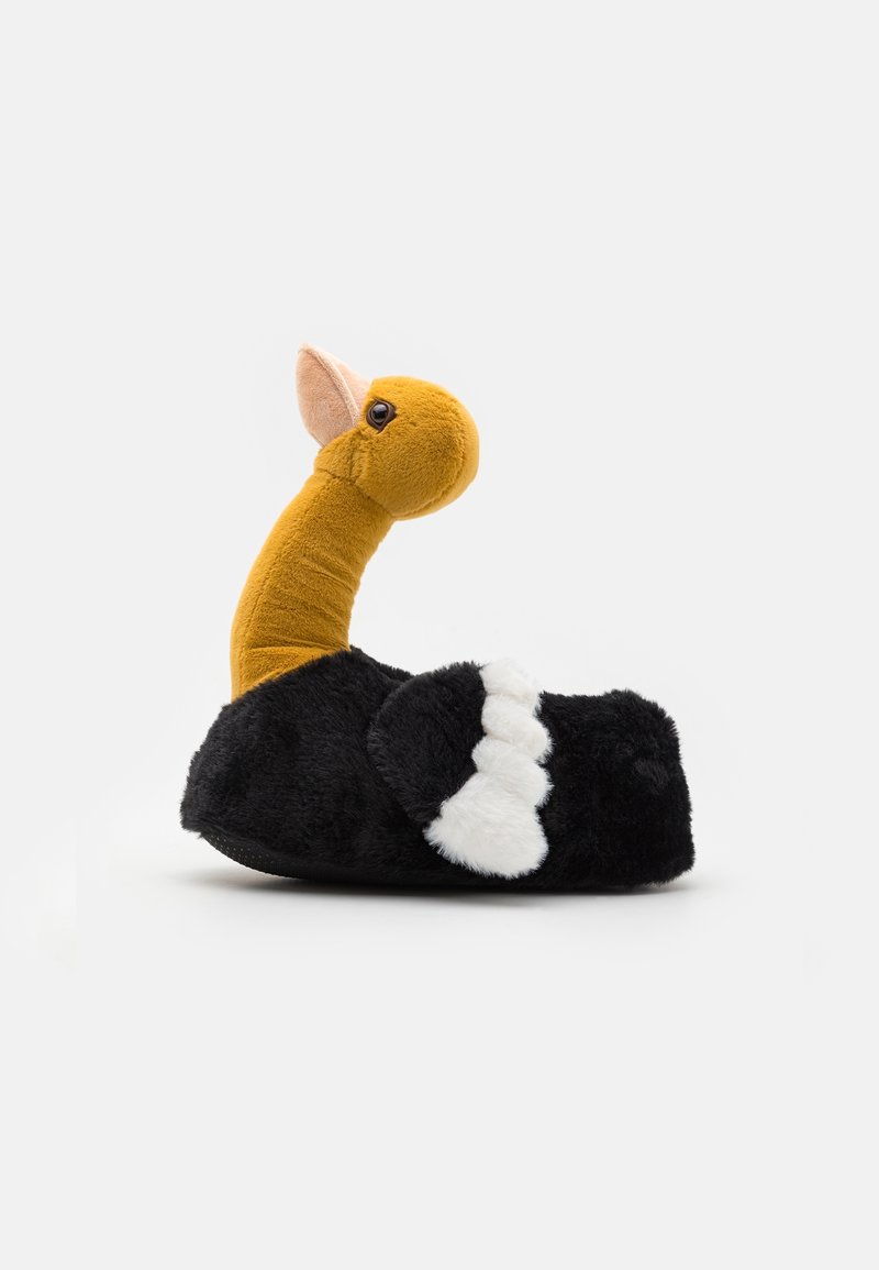 Chausson à thème autruche en peluche noire et jaune, présentant un long cou, une tête ronde et des accents blancs doux sur le corps.