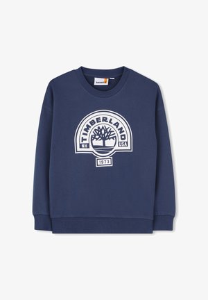 Felpa blu navy con collo rotondo, polsini e orlo a coste. Presenta un logo Timberland bianco e un motivo ad albero. Realizzata in tessuto misto cotone.