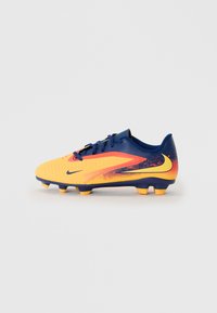 Crampons de football Nike avec un design jaune et bleu, un dessus texturé, des détails dégradés et six pointes orange pour une meilleure traction.