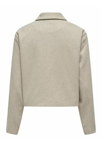 Veste courte beige vue de dos avec manches longues et petit col plié.