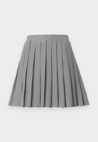 Fustă plisată cu model houndstooth alb-negru, cu talie fixă și design fluid, evidențiind un material texturat și un model îndrăzneț.