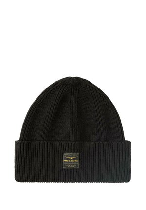 Bonnet en tricot noir avec une texture côtelée, présentant un revers et une étiquette rectangulaire avec du texte doré sur un côté.