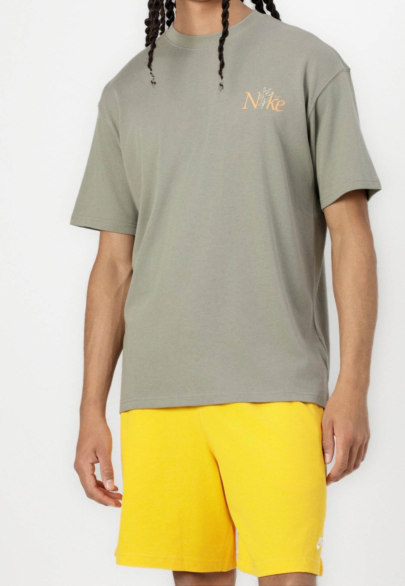 olive and orange nike shirt