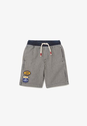 Gestreepte korte broek in marineblauw en wit katoen, met een elastische tailleband, een koordje en twee patches op het linkerbeen.