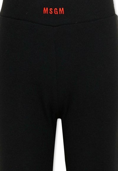 Leggings de punto negro acanalado con el logo rojo de MSGM bordado en la parte frontal de la cintura.