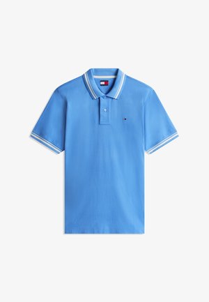 Világoskék, rövid ujjú póló ing fehér csíkos gallérral és ujjmandzsettával, apró Tommy Hilfiger logóval a mellkason.