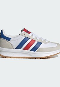 White sneaker with grey suede accents, featuring blue and red stripes. Smooth upper, cushioned sole marked "CLOUDFOAM," rubber outsole.