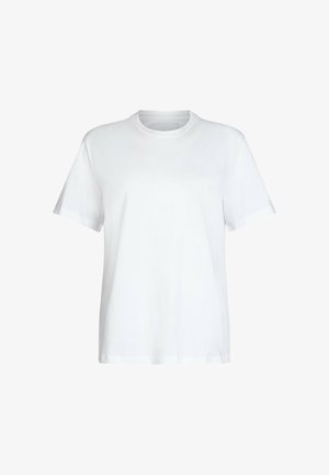 T-shirt bianco in cotone con scollo rotondo, maniche corte e orlo dritto. Texture liscia senza motivi o accenti visibili.