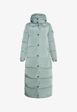 Pitkä, vaaleanvihreä pehmeä takki hupulla, jossa on mustat napit, sivutaskut ja tilkkutekstuuri. Liukas, kiiltävä pinta.