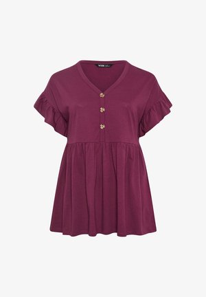 Blusa viola a maniche corte con maniche arricciate, scollo a V e tre bottoni in legno al centro davanti, vestibilità ampia con vita arricciata.