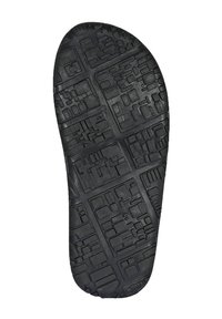 Black rubber sole with textured surface, featuring geometric patterns and various raised shapes for grip and traction.