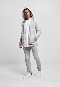 ZIP - Liibuvad teksad - lighter washed