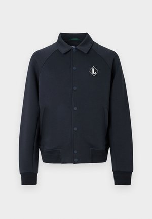 Marineblauwe sweatshirtbomberjack met kraag, drukknoopsluiting aan de voorkant, zijzakken en een diamanten logo. Geribbelde manchetten en een patroon aan de onderzoom.