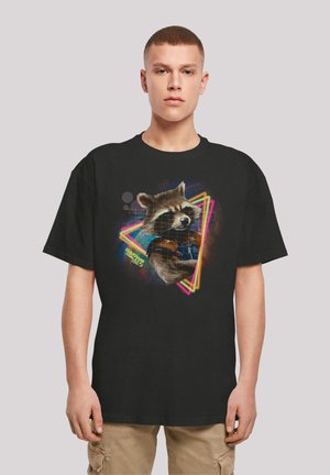 Black cotton t-shirt featuring a graphic of a raccoon in a blue outfit, surrounded by colorful geometric neon accents and text.