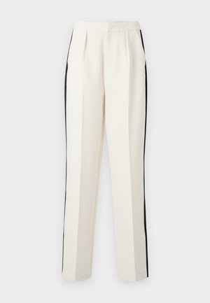 Pantaloni color crema con strisce laterali nere, caratterizzati da un taglio dritto e una parte anteriore plissettata, realizzati in un tessuto testurizzato.