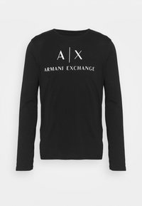 Schwarzes Langarm-T-Shirt aus Baumwolle. Verfügt über das weiße Druck-Logo der Marke "A|X ARMANI EXCHANGE" auf der Vorderseite, einen runden Halsausschnitt und eine taillierte Form.