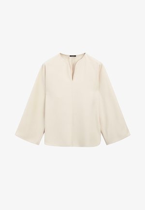 Blouse beige clair avec un décolleté en V, des manches trois-quarts et une coupe décontractée. Fabriquée en tissu doux et lisse avec des détails de couture minimaux.