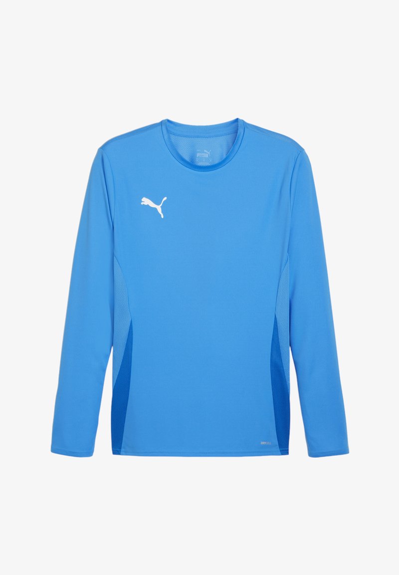 Maglietta sportiva a maniche lunghe di colore blu brillante, con un pannello laterale in mesh blu testurizzato, logo bianco sul petto e finitura in tessuto liscio.