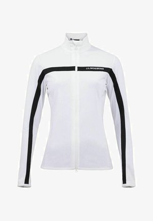 Chaqueta deportiva blanca con cuello alto, cremallera negra y rayas en los hombros, y logo. Textura suave y diseño ajustado con mangas largas.