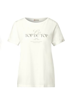 Witte katoenen t-shirt met een ronde halslijn en korte mouwen, met in grijs bedrukte tekst: "Le TOP DU TOP OWN THE DAY" en een aanvullende zin.