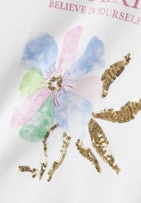 Name it NKFDUKKO  biały