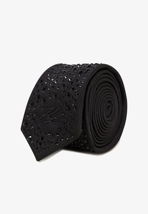 Black tie with textured fabric, embellished with black rhinestones. Rolled design features a narrow tip and an embroidered logo.