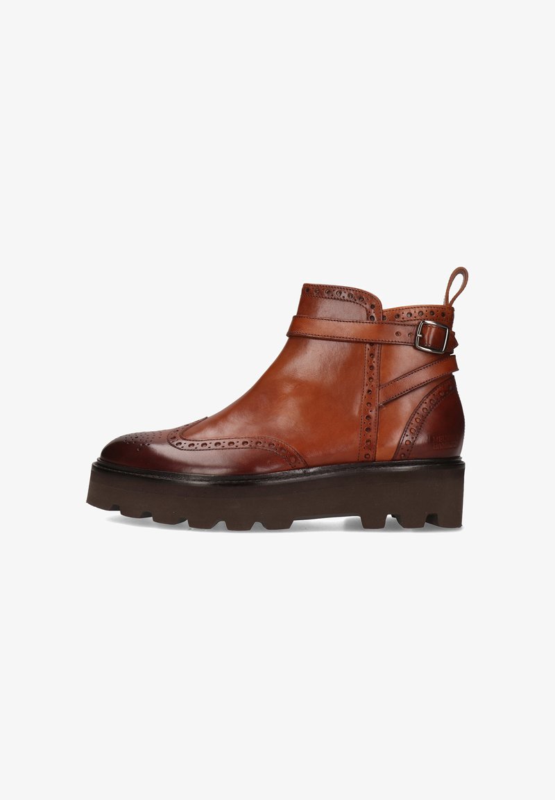 Braune Leder-Ankle-Boots mit Broguemuster, einem Riemen mit Schnalle und einer robusten Gummisohle für zusätzlichen Halt. Mit einer Zugschlaufe auf der Rückseite.