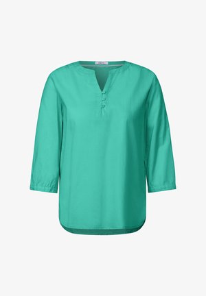 Blusa turchese con scollo a V, maniche a tre quarti e patta con quattro bottoni. Realizzata in tessuto morbido con una vestibilità casual e rilassata.