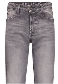 Jeans in denim grigio con una vestibilità slim, Tasconi frontali e chiusura con bottone. La leggera scoloritura offre texture e interesse visivo.
