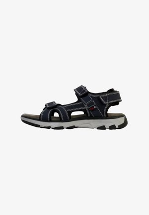 Navy blue sandal with adjustable straps, gray rubber sole, stitched accents, open toe design, and cushioned footbed for comfort.