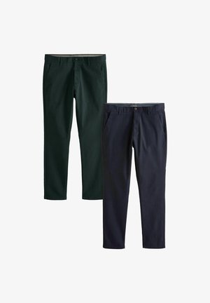 Zwei Paar Chinos: eines in Dunkelgrün und eines in Marineblau. Beide besitzen einen lässigen Schnitt, seitliche Taschen und kontrastierende Taillenbanddetails.