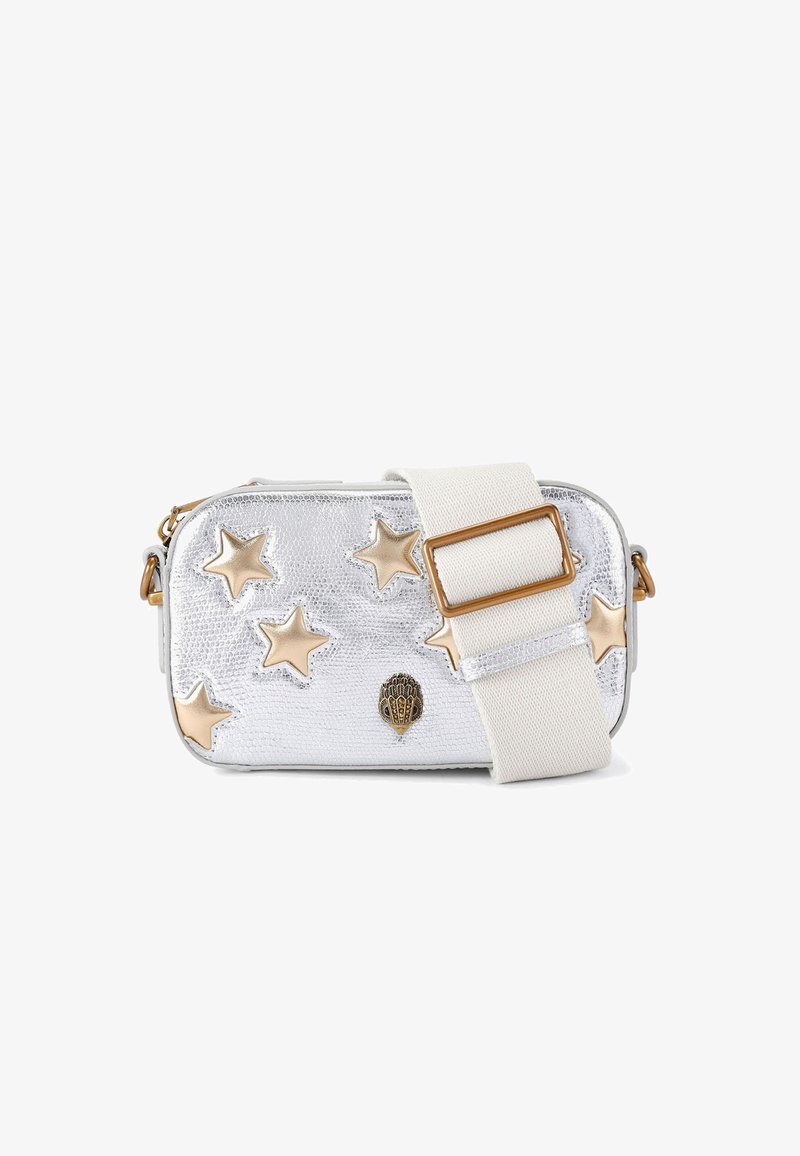 Silver metallic handbag with a textured finish, featuring gold star accents and a cream adjustable strap. Includes logo detail on front.