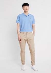 Lacoste Polokošeľa - ipomee chine