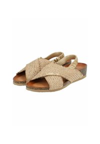 Sandalias de paja tejidas en color beige con correas entrelazadas y talón elástico, suela plana de corcho. Parte superior texturizada y plantilla de cuero suave.