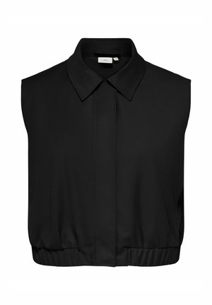 Chemise noire sans manches et courte avec col pointu, patte de boutonnage cachée à l’avant et ourlet élastiqué.