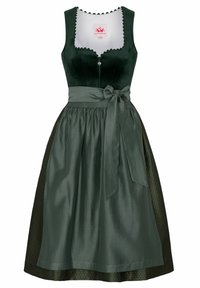 Dark green velvet dress with a fitted bodice, decorative scalloped neckline, and a wide, tied satin belt; pleated skirt with patterned fabric.