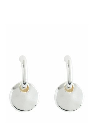 Pair of polished silver hoop earrings each with a smooth, flat circular pendant hanging from the hoop against a white background.