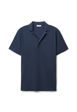 Polo shirt blu navy con vestibilità comoda, maniche corte e apertura con due bottoni. Realizzato in tessuto di cotone testurizzato.