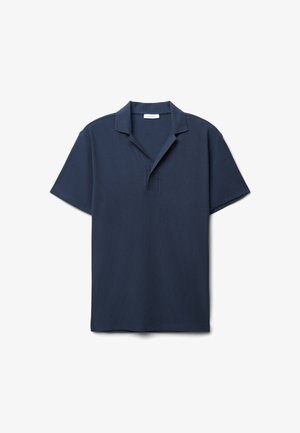 Polo shirt blu navy con vestibilità comoda, maniche corte e apertura con due bottoni. Realizzato in tessuto di cotone testurizzato.