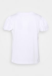 Vit bomull t-shirt med kort puffärmar, rund halsringning och rak nederkant. Enkelt och klassiskt design utan mönster.