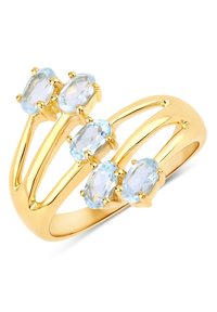 Bague en or ornée de cinq pierres ovales de couleur bleu clair, avec un design à bande divisée, présentant une surface polie et une texture lisse.