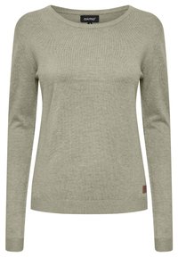 Lys grønn langermet genser med rund hals og ribbestrikkede mansjetter, laget av mykt materiale. Liten logopatch ved kanten.