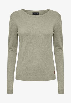 Hellgrüner Langarmpullover mit Rundhalsausschnitt und gerippten Bündchen, aus weichem Material gefertigt. Kleines Logo-Patch am Saum.