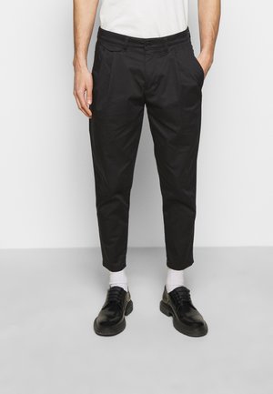 Spodnie materiałowe